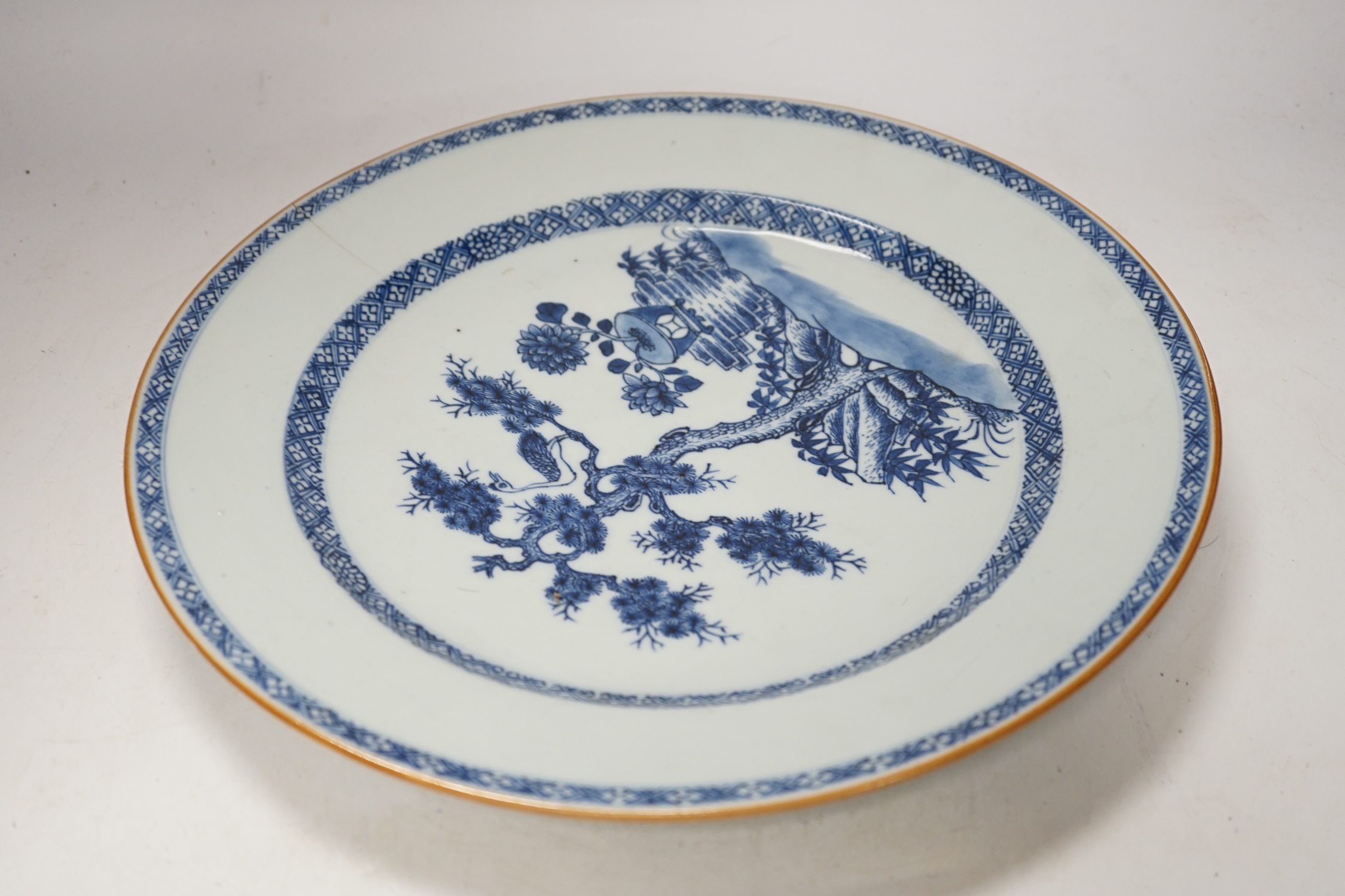 Three Chinese blue and white dishes or plates, Kangxi to Qianlong period and two later covers, largest plate 32cm diameter